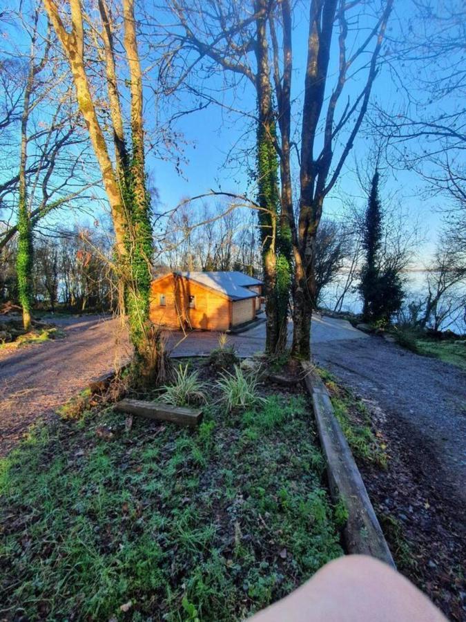 Stunning Log Cabin On The Lake Villa Portroe Esterno foto